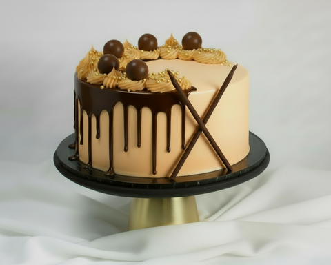 Chocolate Orange Cake, Rich chocolate and zesty orange is another classic flavour combination, bringing out the best in each other in the most delightful way. This pretty cake has two layers of fluffy chocolate sponge and a light tangy orange whip, chocolate ganache, chocolate drip, orange slices and raspberries to garnish. Quite the perfect combination indeed!