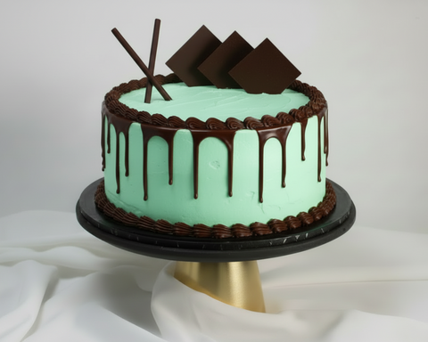 Mint Chocolate Cake
Meet our brand-new Mint Chocolate Cake—the flavour combination you've been asking for! Two generous layers of fluffy chocolate sponge are paired with refreshing mint whipped cream, then finished with rich chocolate piping, a chocolate drip, and decorative chocolate pieces. This elegant cake brings together the best of both worlds in every bite. Order with confidence knowing we deliver fresh to your door across London, with same-day and next-day options available.